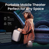 Lightweight JMGO N1S 4K portable mini projector being placed into a car trunk, perfect for travel